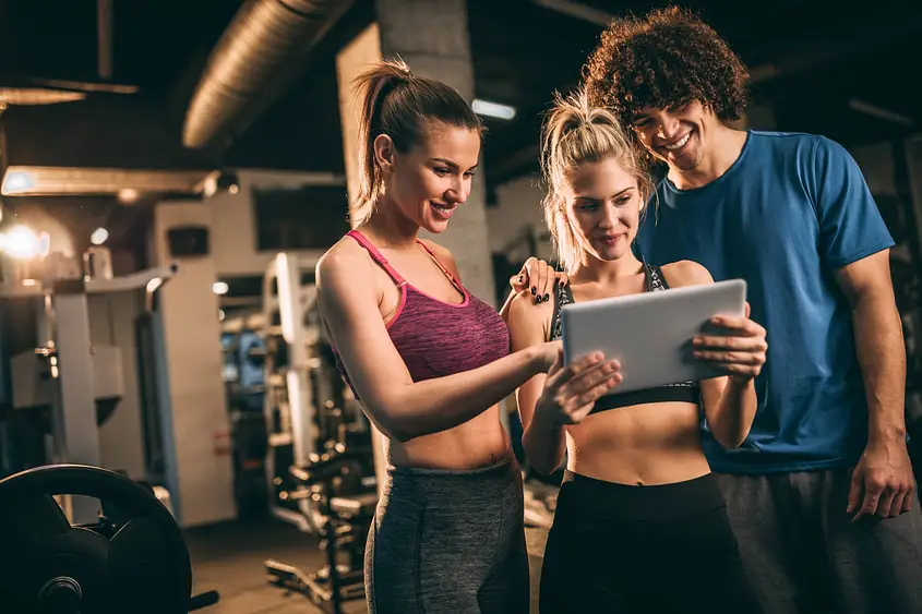 Happy-friends-having-fun-in-fitness-centre